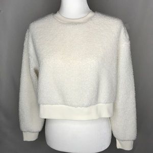 Women’s Crop Sweater Cream ribbed banded at waist and sleeves. Size Small